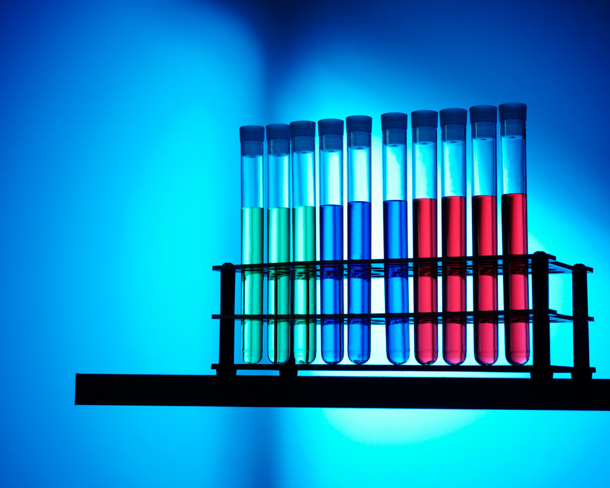 fluorescent chemicals in test tubes