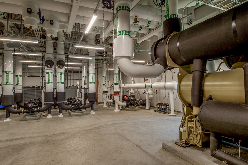 Insulated water pipes and pumps for the HVAC system for a large office complex.
